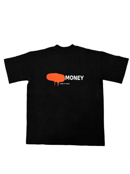 Black organic cotton oversized T-shirt featuring an orange spray paint graphic and text on the back