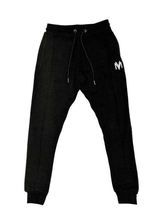 Slim-fit joggers in black with a white embroidered YM logo on the left