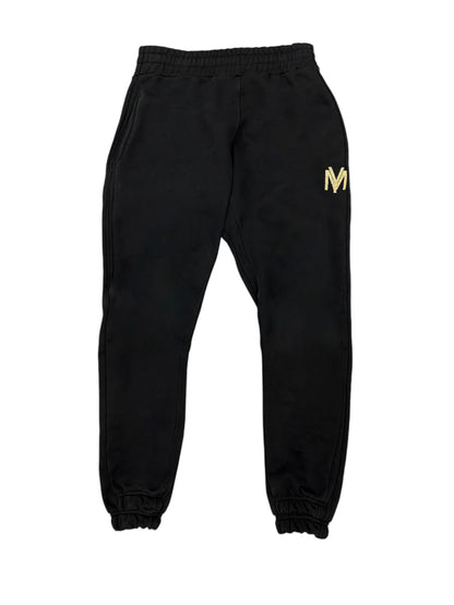 Black organic cotton joggers with a gold embroidered YM logo on the left side